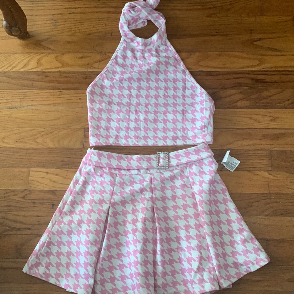 Pink and white patterned 2 piece. Cropped top and skirt. Barbie colored outfit.